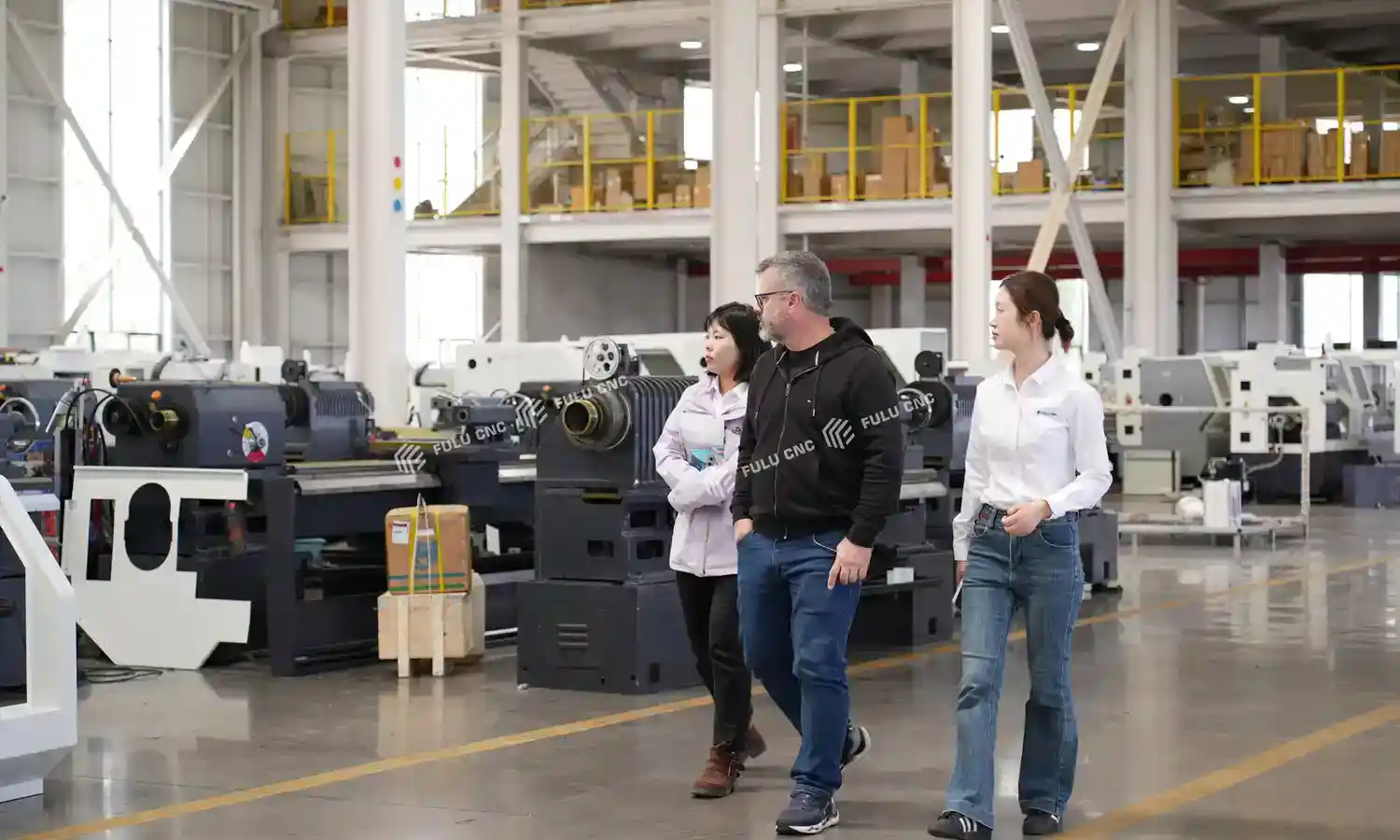 customer inspecting cnc lathe machine